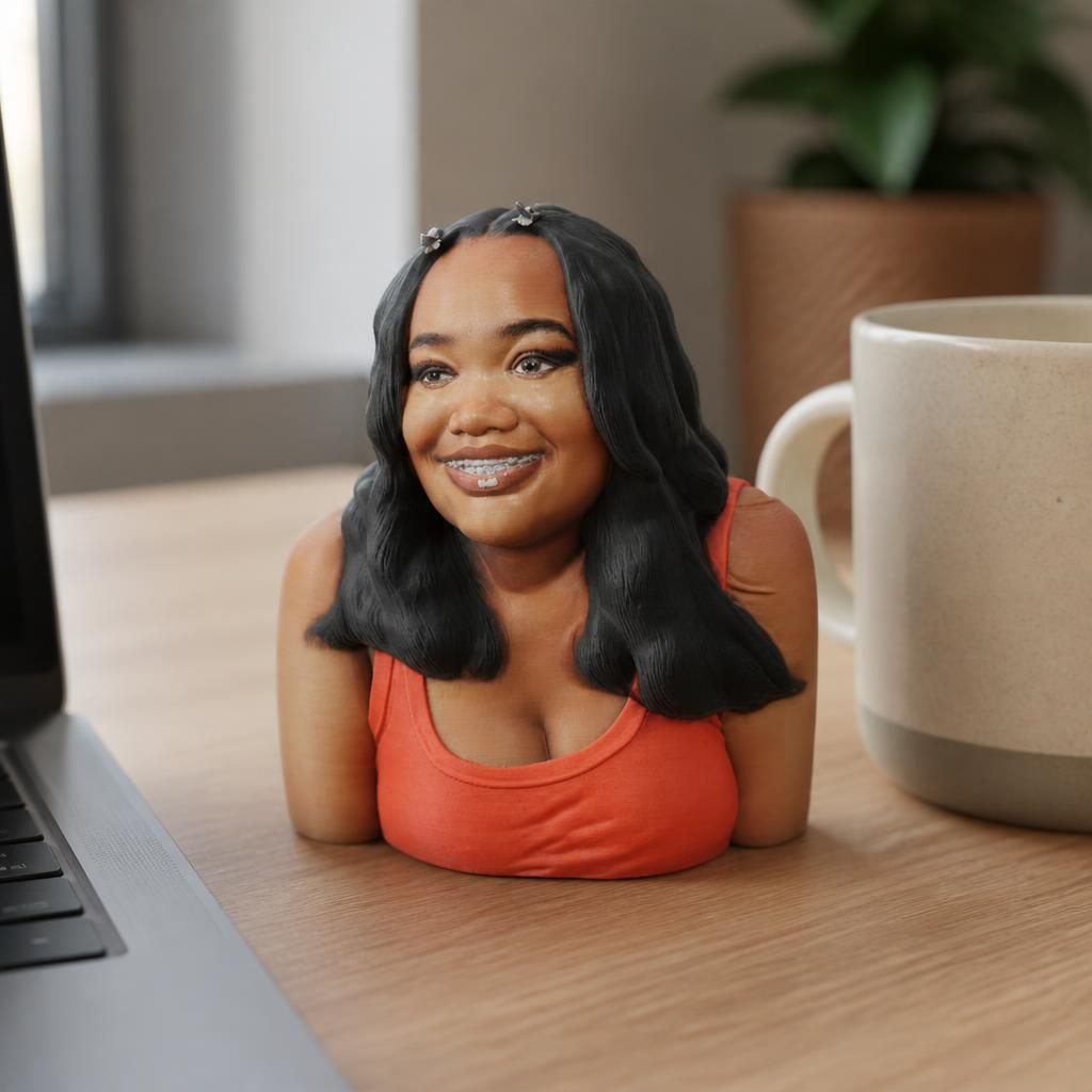 Mia as a real 3D print on a desk
