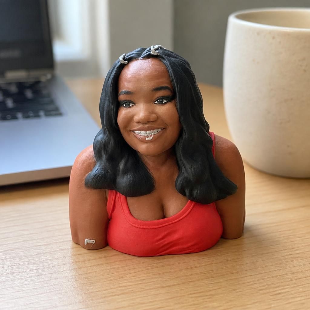 Mia as a real 3D print on a desk